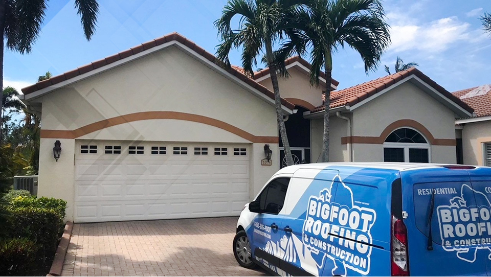 a crew of roofers installing shingles